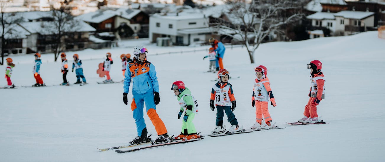 Kids Ski Lessons (4-12 y.) "Kinderland Rinn" for All Levels.