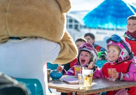 Kids are doing Kids Ski Lessons (3-13 y.) for All Levels with Starski Grand Bornand.