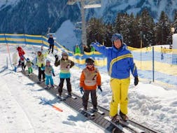 Kids Ski Lessons (6-16 y.) for Intermediate and Advanced from Ski School Vreni Schneider Elm.