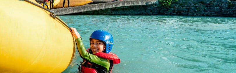 A kid enjoying the Family Rafting on the Lütschine River in Interlaken with Outdoor Switzerland AG