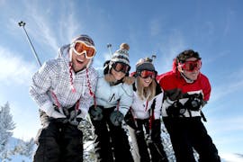 People having fun during their Private Ski Lessons for Adults - High Season - Arc 2000 with Evolution 2 - Arc 2000.