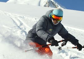 A person going Private Off-Piste Skiing Lessons for Adults - Arc 2000 with Evolution 2 - Arc 2000.