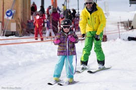 A kid is doing Private Ski Lessons for Kids of All Ages - February with Evolution 2 La Clusaz.