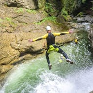 During the advanced canyoning in the Strubkamm a Guest of Outdoor center Baumgarten jumps in the water of the  Strubklamm.
