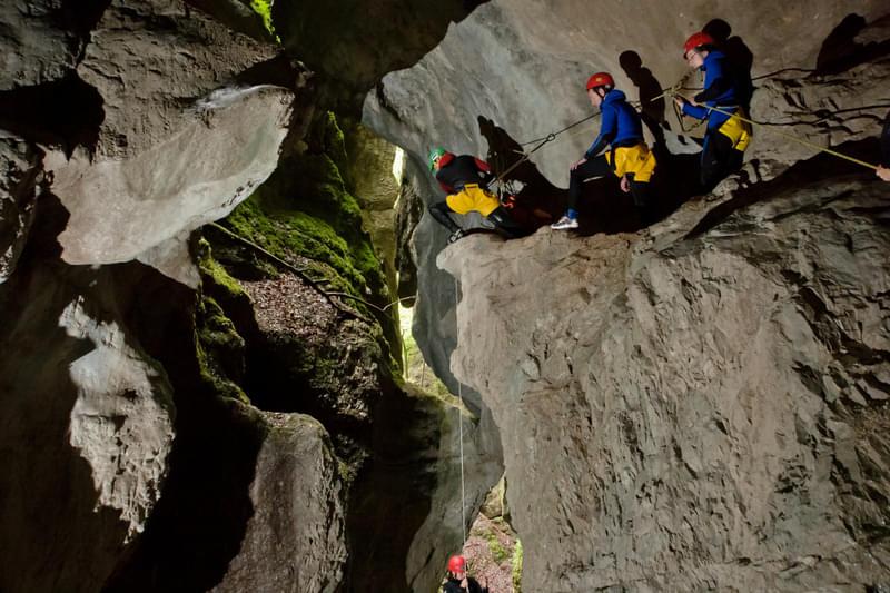 Three people in the canyon while Canyoning in Taxaklamm with Mountain High Adventure Center Tirol.