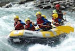 A group of 6 people including children during the Rafting on the Ubaye River for Families with Rapid'Eau Ubaye.