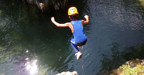 Canyoning in Zemmschlucht for Beginners near Mayrhofen with Actionclub Zillertal A child jumping into a natural pool during Canyoning in Zemmschlucht for Beginners near Mayrhofen with Actionclub Zillertal.
