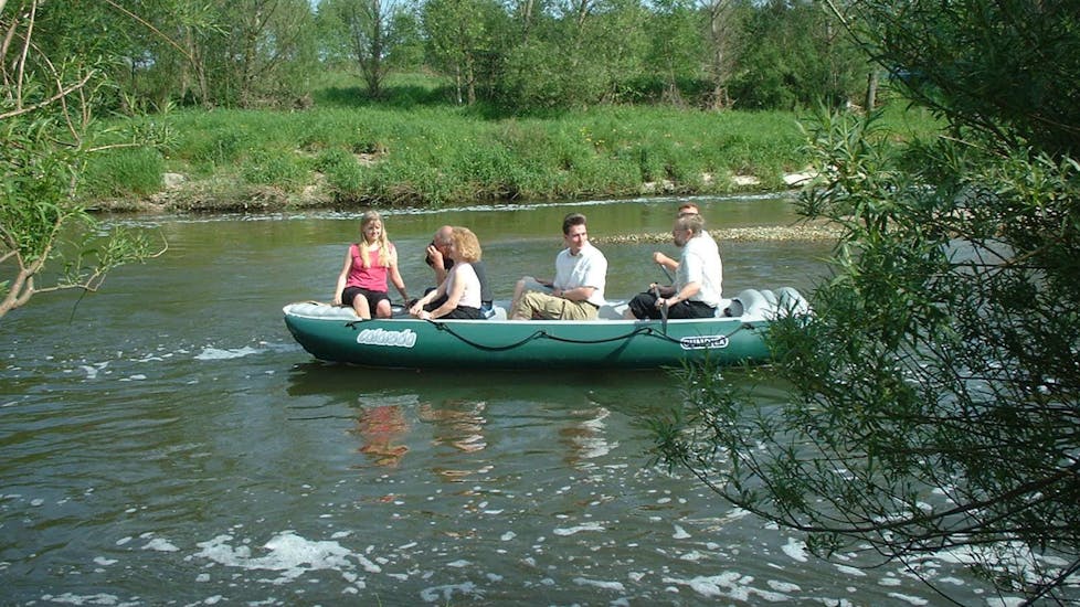 People in a raft while Rafting on the Neisse River from Rothenburg - Short Tour with Neisse Tours Rothenburg.