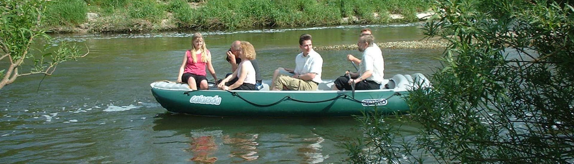 People in a raft while Rafting on the Neisse River from Rothenburg - Short Tour with Neisse Tours Rothenburg.