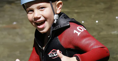 River Trekking in Basse Besorgues Canyon for Families with GEO Ardèche Canyon A kid is happy to have participated in his first River Trekking in Canyon de la Basse Besorgue for Famillies with Geo Ardèche Canyon.