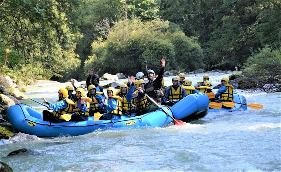 Some participants of the Rafting Rio Claro organized by X Raft Val di Sole. are smiling at the camera.