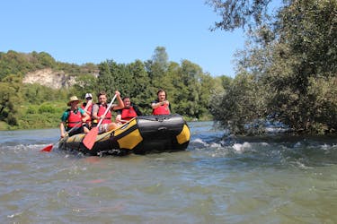 A boat full of people during Soft Rafting on the Rhine - Flowing Rhine with Rheinraft