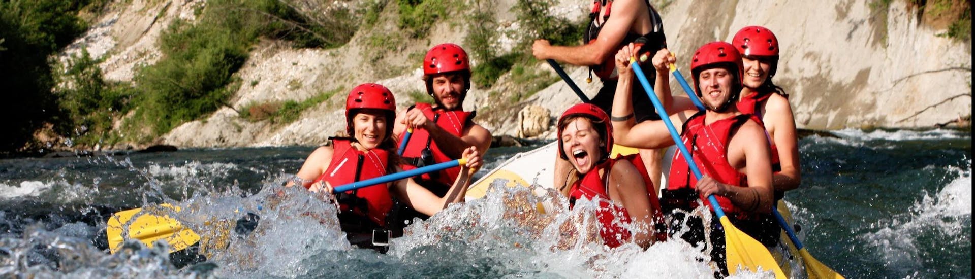 Picture of a group of girls in action during the rafting trip with OUTdoor Slovenia Bled.