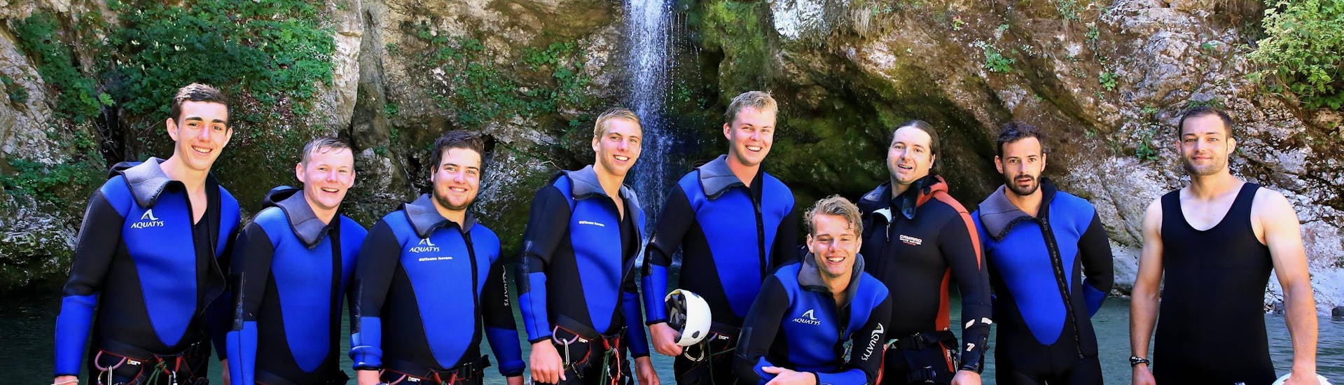 Group picture taken during the rafting and canyoning combo hosted by OUTdoor Slovenia Bled.