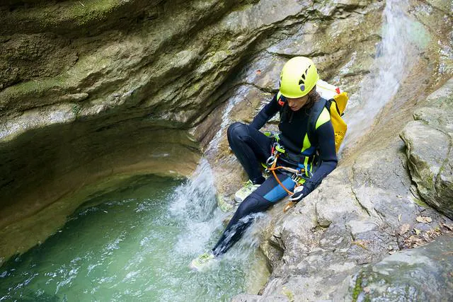 Vertical Canyoning in Taurinya Canyon with Extérieur Nature Pyrenees A man is enjoying Vertical Canyoning in Taurinya Canyon