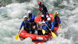 A group of friends have a good time while taking part to the Rafting Fun on Sesia river provided by the Centro Canoa e Rafting Monrosa.