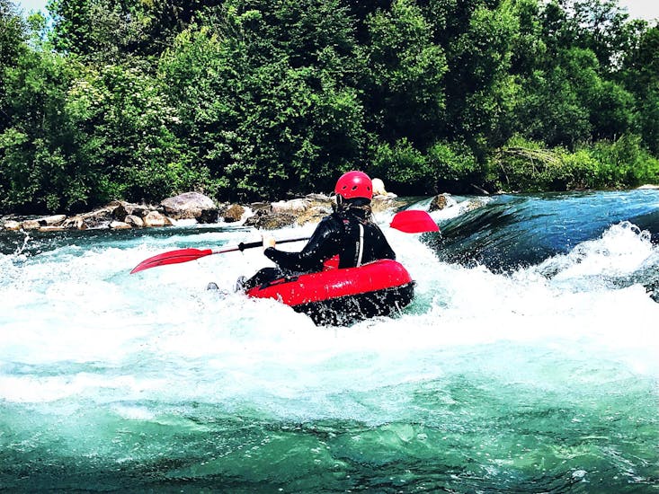 A person in a tube while Tubing on the Iller River in Allgäu in Immenstadt with MB Events & Adventures Allgäu & Bodensee
