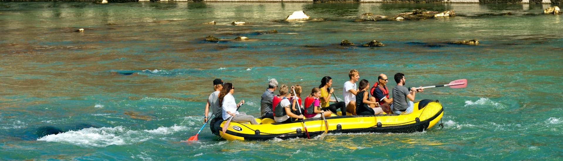 People in a boat while Soft Rafting on the Rhine River for Groups with MB Events & Adventures Allgäu & Bodensee.