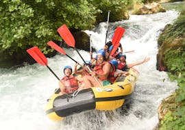 People having fun while they are Rafting on the Cetina River and do Cliff Jumping with Rafting Pirate.