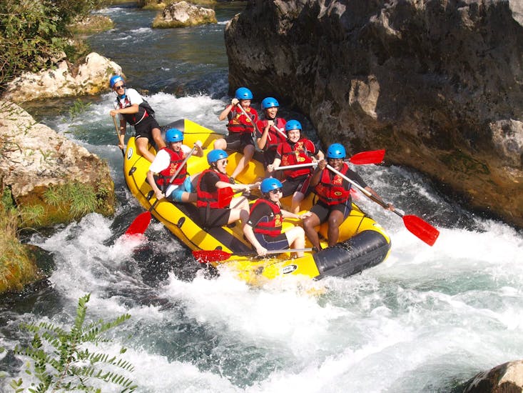 People having fun while they are Rafting on the Cetina River and do Cliff Jumping with Rafting Pirate.