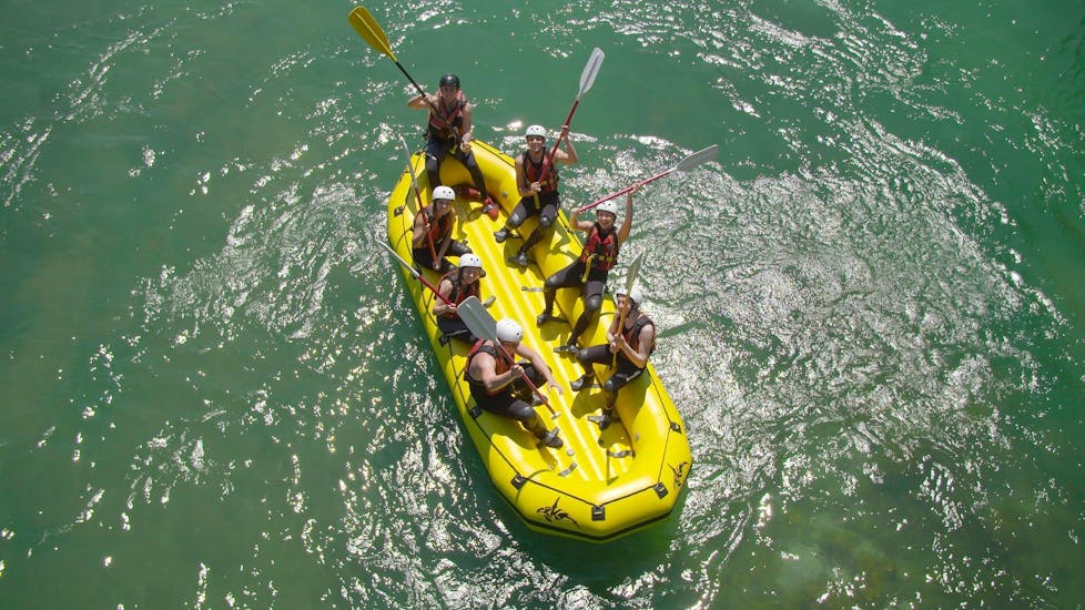 Participants rafting down the Sava River during a rafting activity in Bled with  Fun Turist Bled.