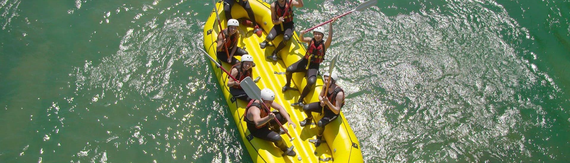 Participants rafting down the Sava River during a rafting activity in Bled with  Fun Turist Bled.
