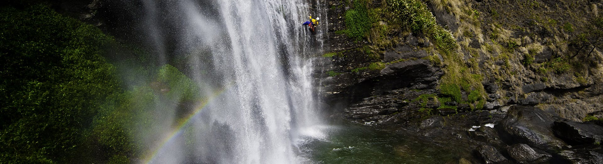 A person is abseiling during the Half Day Canyoning near Laruns in Ossau Valley with Expérience Canyon.