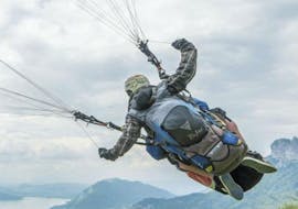 A man is enjoying his Tandem Paragliding in Lake Annecy - Sensations activity with Flyeo.