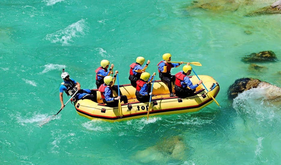 People on the raft during the Rafting on the Soča River for Families with TOP Rafting Centre Bovec.
