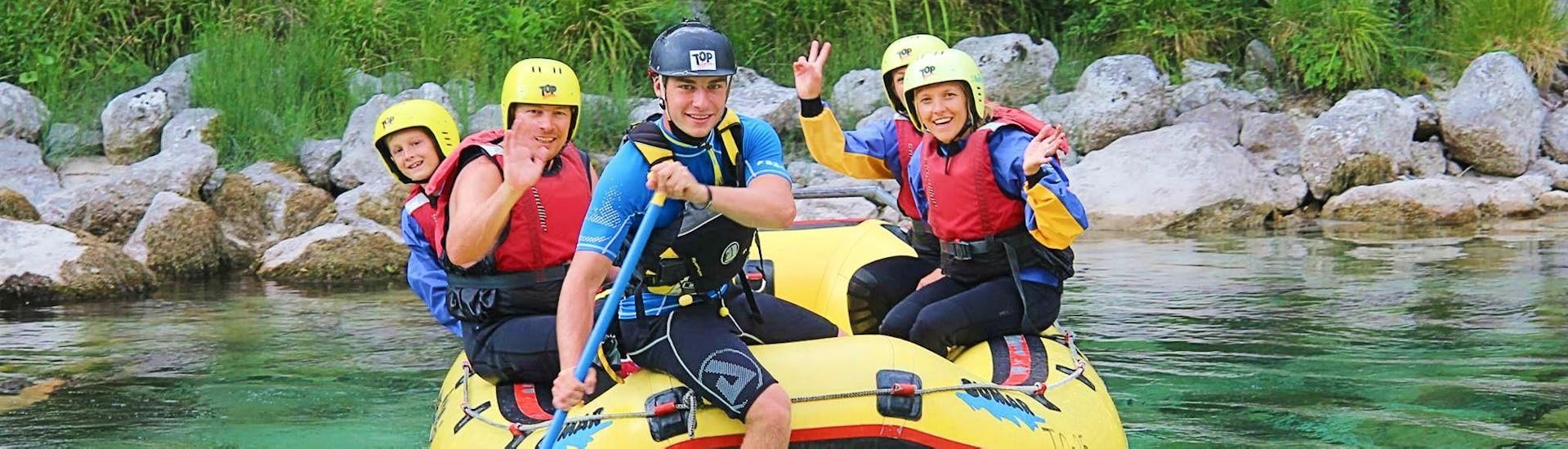 People on the raft during the Rafting on the Soča River for Families with TOP Rafting Centre Bovec.