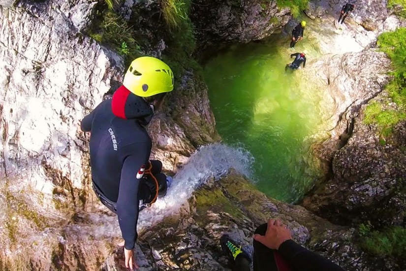 Someone is trying the Extreme Canyoning in the Fratarca Gorge with TOP Rafting Centre.