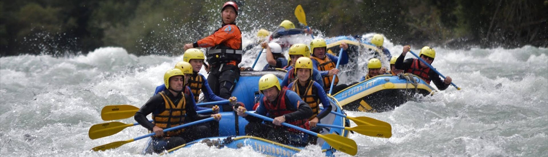 During the Rafting "Extreme Tour" on the Sanna, a certified rafting guide from WhyNot Adventures is commanding his rafting crew whilst tackling very challenging river section.  