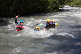 A group of friends is enjoying their Hydrospeed on Isère River - Gorges Course activity with Franceraft.