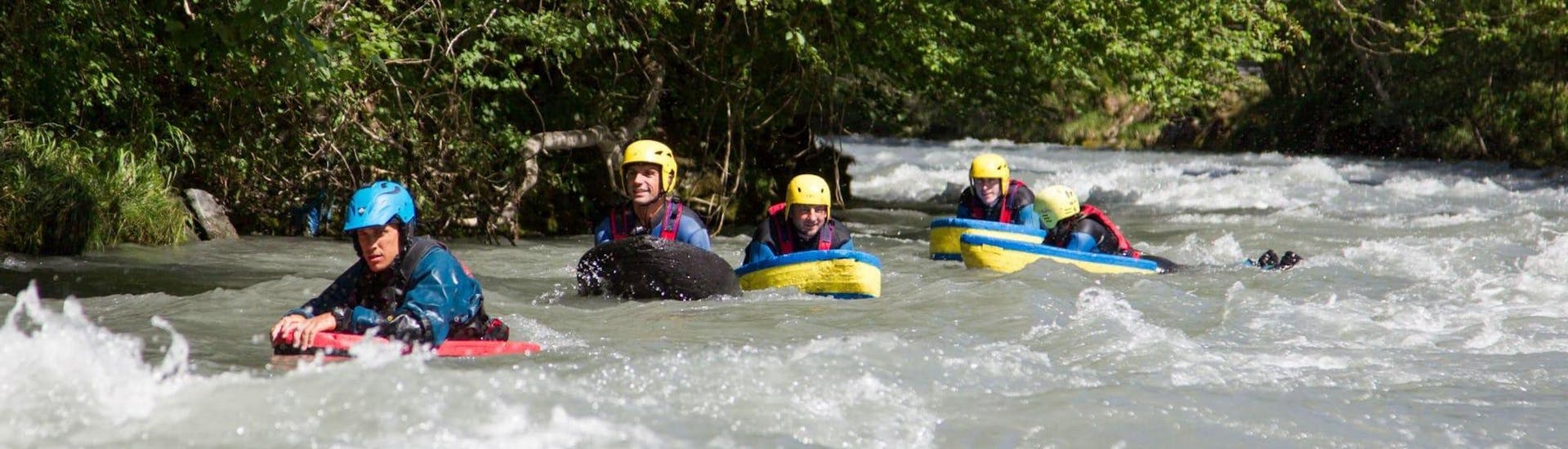 A groupe is having fun during their Hydrospeed on Isère River - Gorges Course activity with Franceraft.