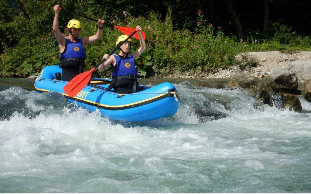 Rafting with the "Mini Raft" on the Sava River with TinaRaft Radovljica Two people during Rafting with the "Mini Raft" on the Sava River with TinaRaft Radovljica.