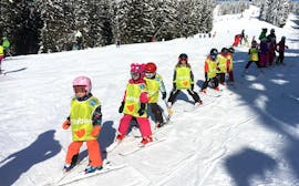 Lezioni di sci per bambini a partire da 5 anni per tutti i livelli con ESI Grand Massif.