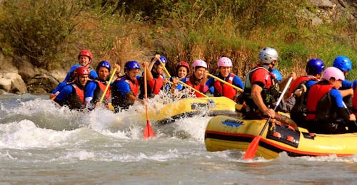 Rafting on the Adda for Groups 8+ People - Full Fun Tour from Rafting Lombardia 3 rafts are going down the Adda during the Rafting on the Adda for Groups 8+ people - Full Fun of Rafting Lombardia.
