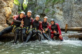A happy group taking a break in the canyon during Canyoning in Strubklamm - Full Day Tour with Der Guide Brixental.
