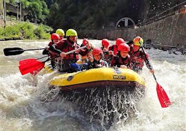 A group of people having fun rafting down the river on their Fun Rafting on the Salzach River with Torrent Outdoor Experience.