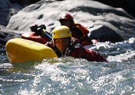 Classic Hydrospeed on the Sesia River with Eddyline - The River Experience Valsesia Someone is smiling in the water during the Classic Hydrospeed on the Sesia River with Eddyline - The River Experience Valsesia.