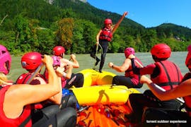 A group of friends is having fun rafting down the Salzach with Torrent Outdoor Experience as part of their Full Day Bachelor Party: Rafting Salzach & Canyoning Almbach.