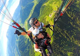 The pilot and a costumer during Tandem Paragliding from Bischling - Thermal Flight with Flugschule Austriafly Werfenweng.
