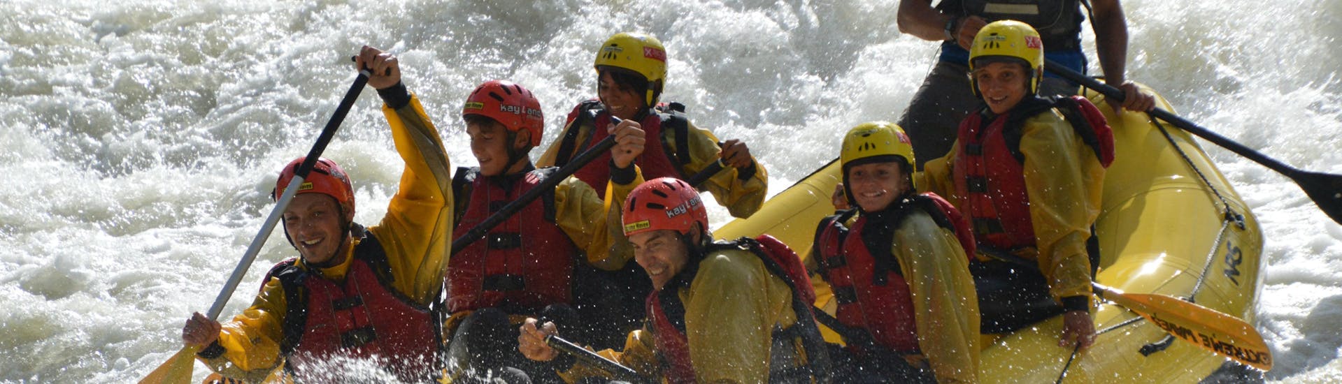 Participants are giving it their best during the Rafting on the Noce in Val di Sole for Families - Exciting.