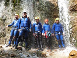 A group is posing for a photo during the Canyoning in the Enns Valley - Redfather Short organised by best adventure company Schladming. 