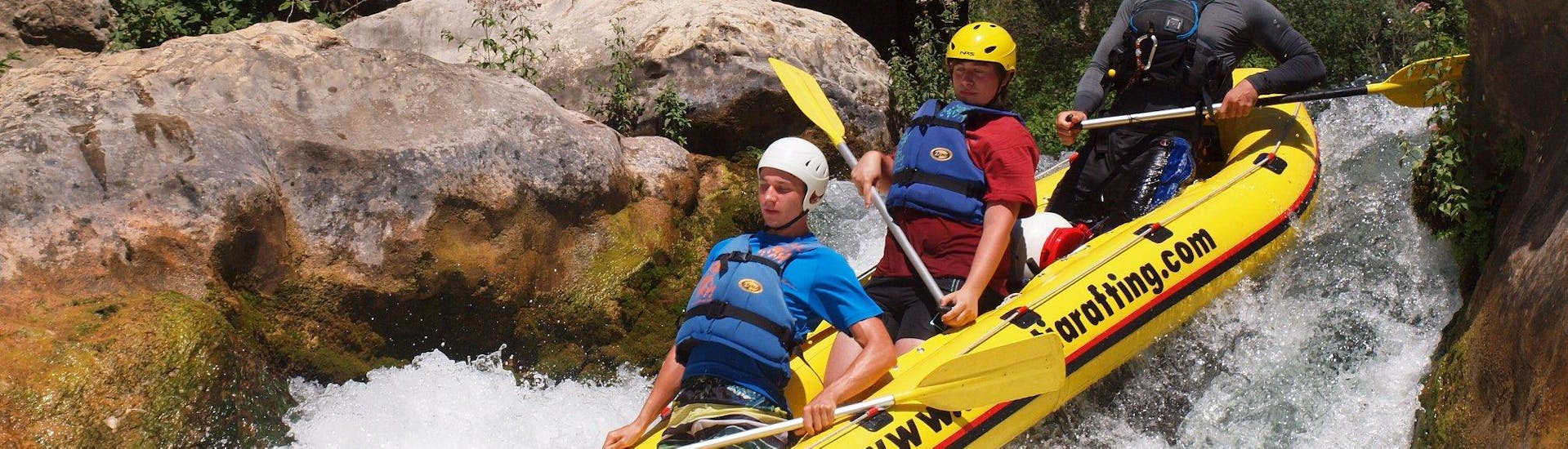 Two people on a mini raft during the Action Rafting in Mini Rafts on the Cetina River with Dalmatia Rafting.
