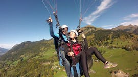 A Pegase Air pilot makes a panoramic tandem paragliding flight over the Samoens valley.