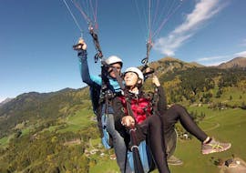 A Pegase Air pilot makes a panoramic tandem paragliding flight over the Samoens valley.