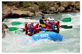 A group of friend go rafting on the Rio Esera with Sin Fronteras Adventure. 