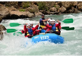 A group of friend go rafting on the Rio Esera with Sin Fronteras Adventure. 