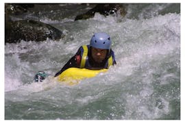 A man does hydrospeed on the Rio Esera with Sin Fronteras Adventure.